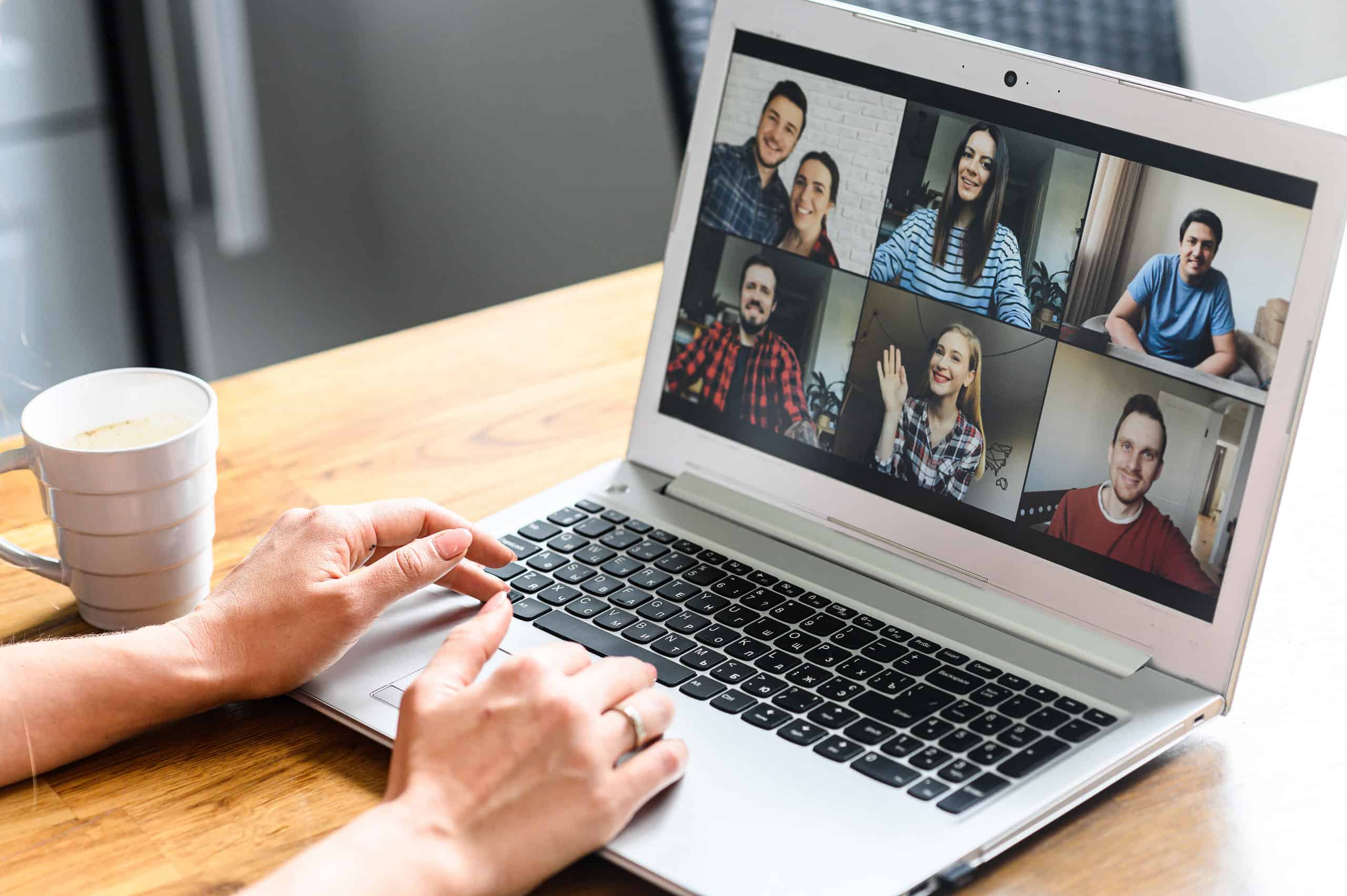 Video meeting on laptop screen, zoom app